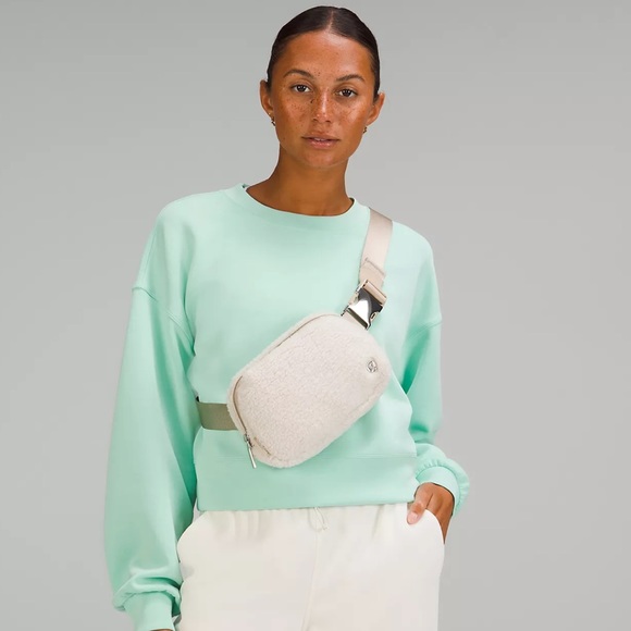 lululemon athletica Handbags - NWOT Everywhere Belt Bag 1L in ivory sherpa / teddy fleece